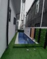 **Jacuzzi & Pool Oasis: 5BR Ikota Duplex – 400M**