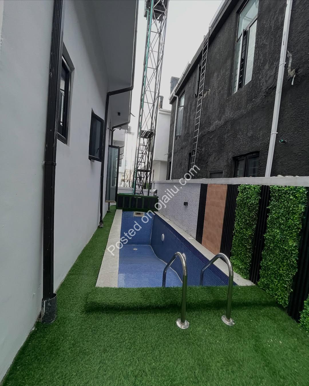 **Jacuzzi & Pool Oasis: 5BR Ikota Duplex – 400M**
