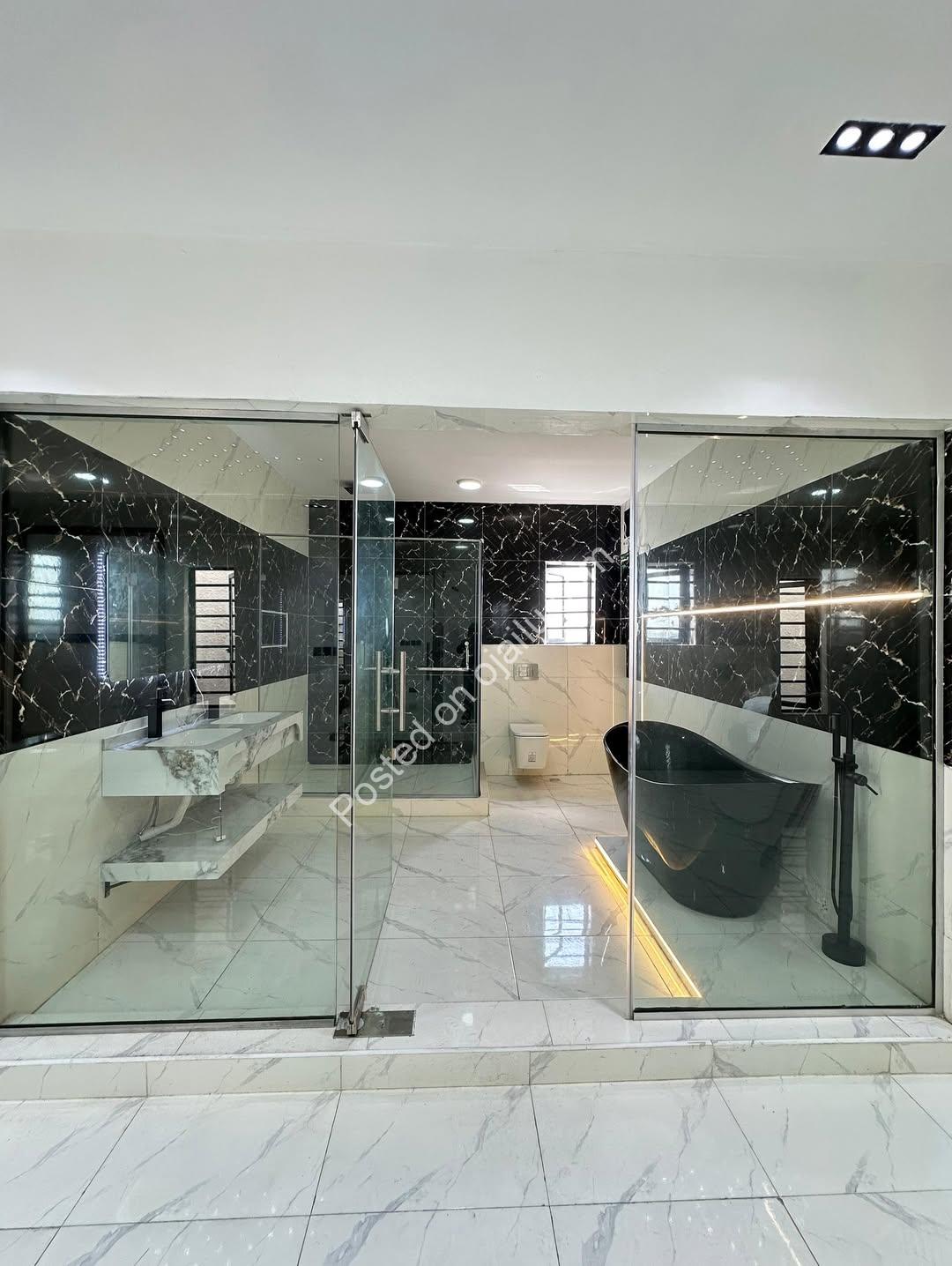 Modern Marvel: 5BR Duplex with Roof Terrace & Pool