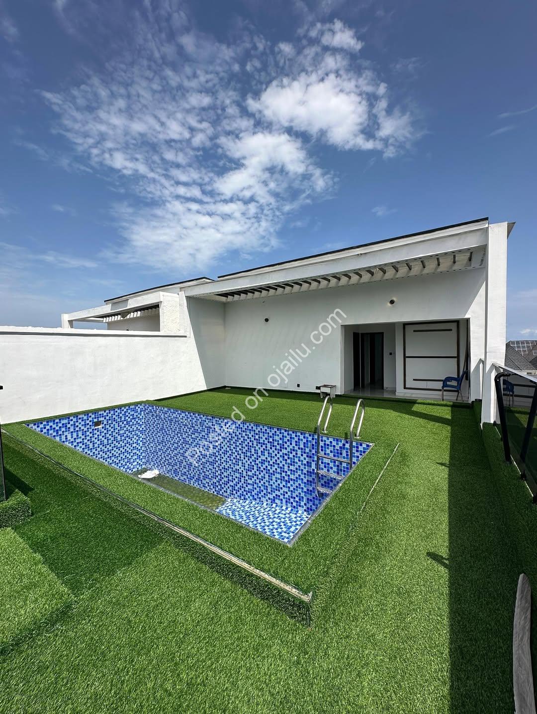 Modern Marvel: 5BR Duplex with Roof Terrace & Pool