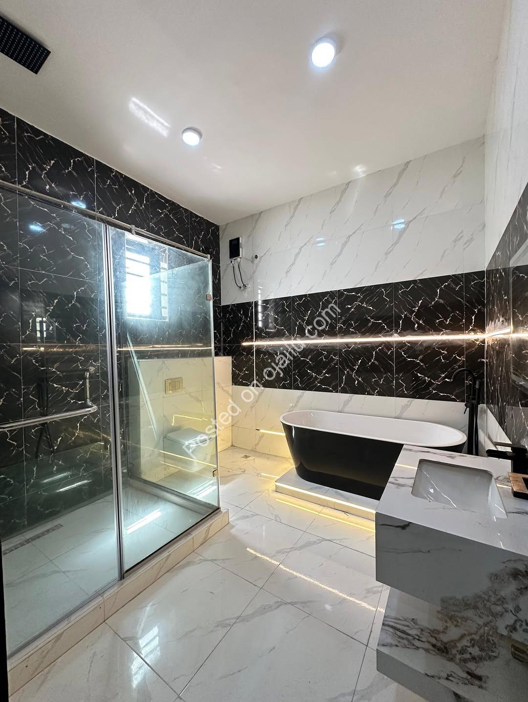 Modern Marvel: 5BR Duplex with Roof Terrace & Pool