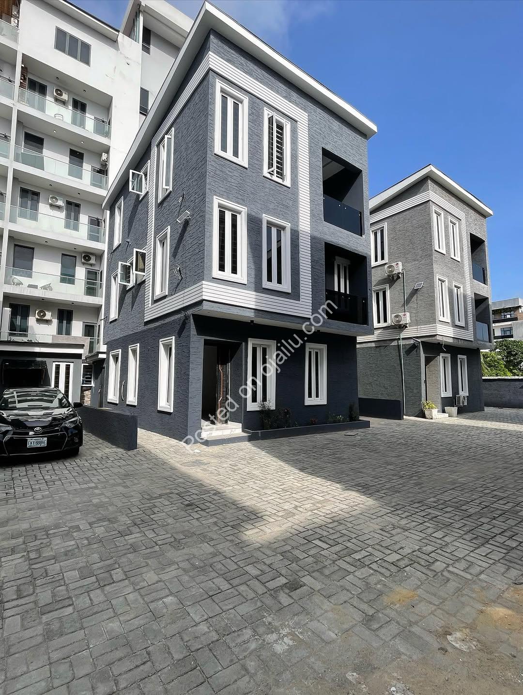 Contemporary 4-Bed Duplex with Walk-In Showers