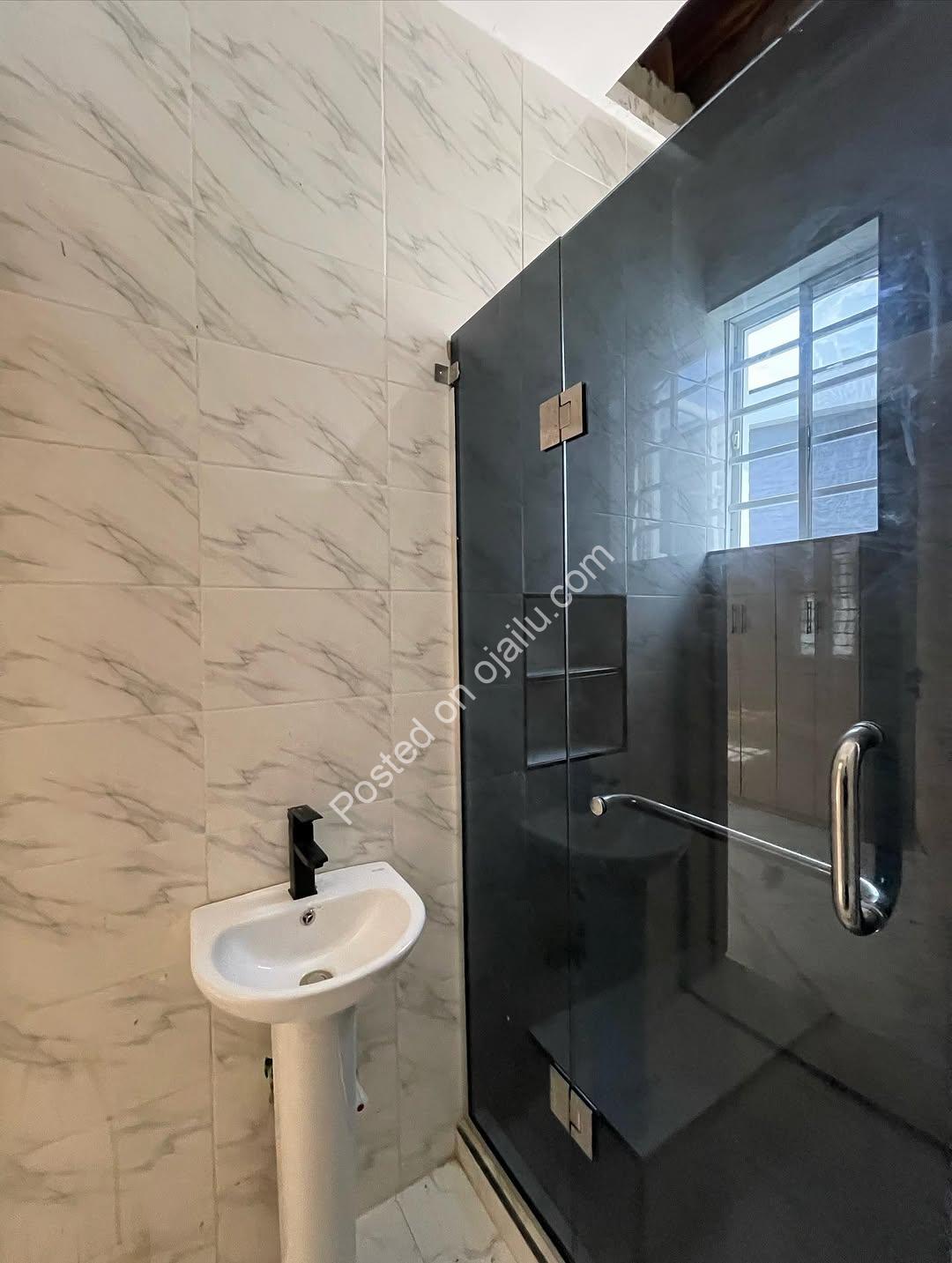 Contemporary 4-Bed Duplex with Walk-In Showers