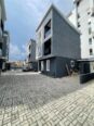 Contemporary 4-Bed Duplex with Walk-In Showers