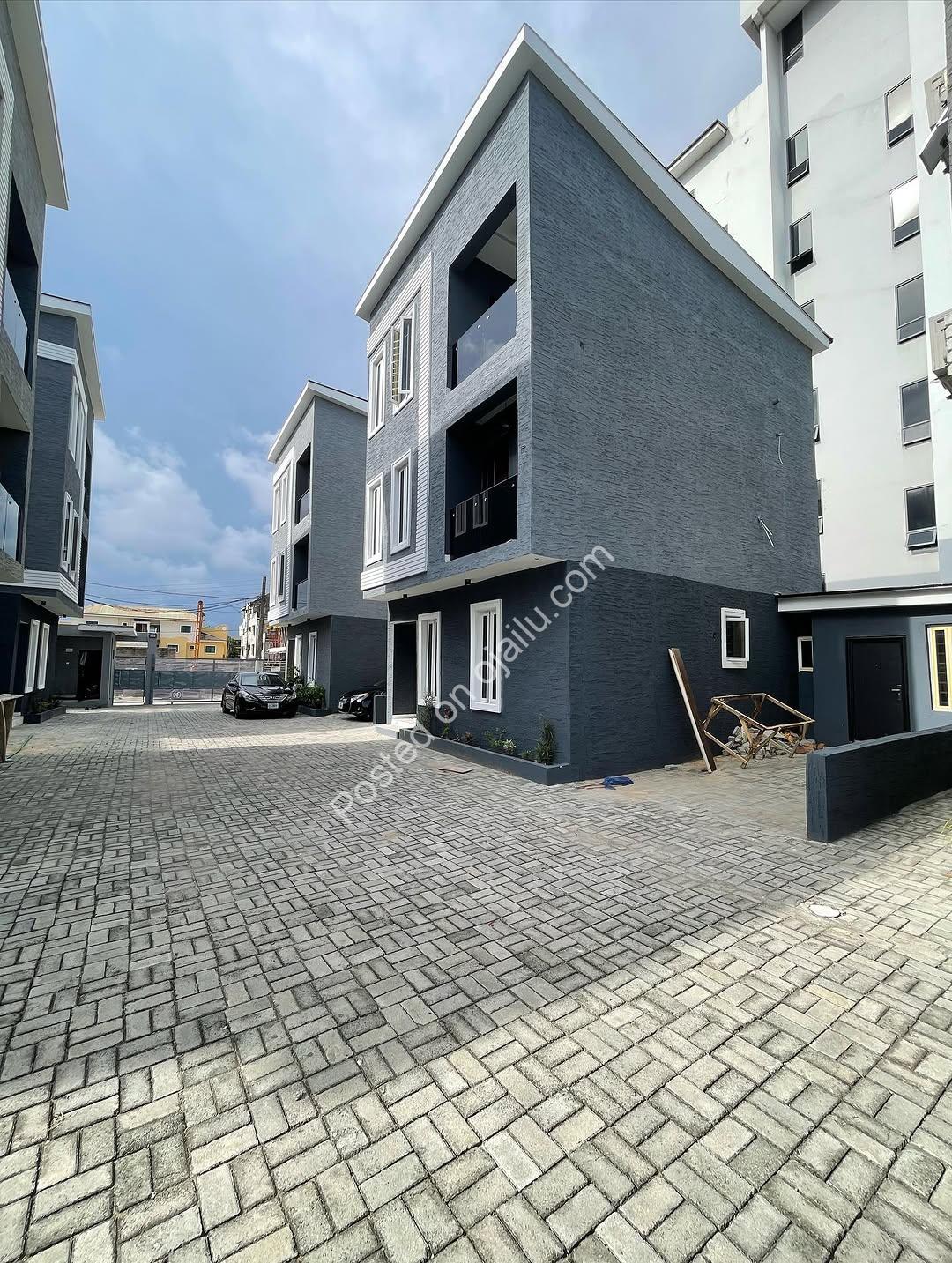 Contemporary 4-Bed Duplex with Walk-In Showers