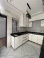 Contemporary 4-Bed Duplex with Walk-In Showers