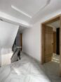 Contemporary 4-Bed Duplex with Walk-In Showers