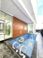 Dive into Resort-Style Living: 5BR Duplex with Pool & Gym