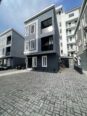 Contemporary 4-Bed Duplex with Walk-In Showers