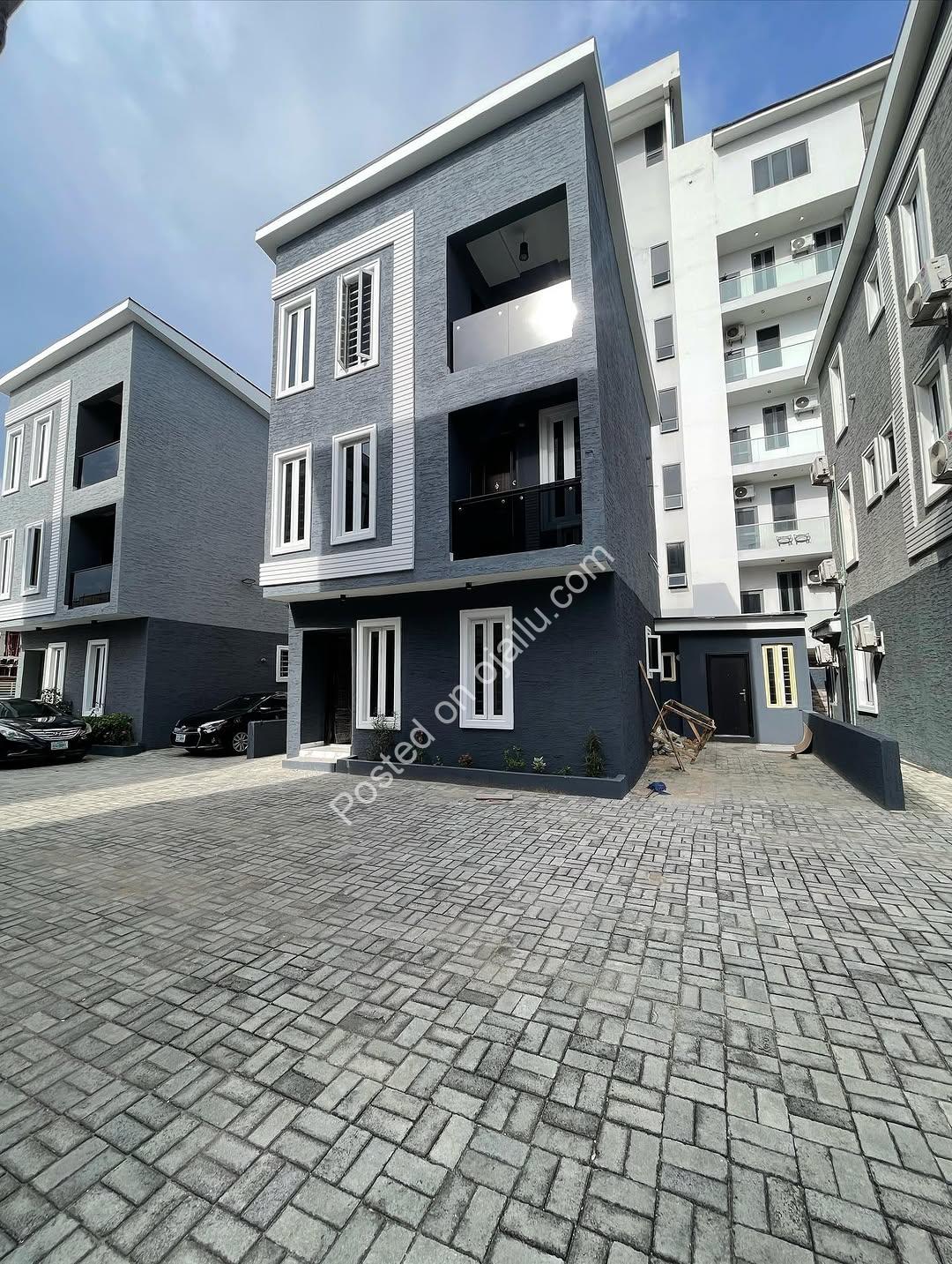 Contemporary 4-Bed Duplex with Walk-In Showers