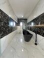 Modern Masterpiece: 5-Bed Smart Home with Rooftop Terrace