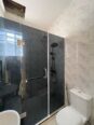 Contemporary 4-Bed Duplex with Walk-In Showers