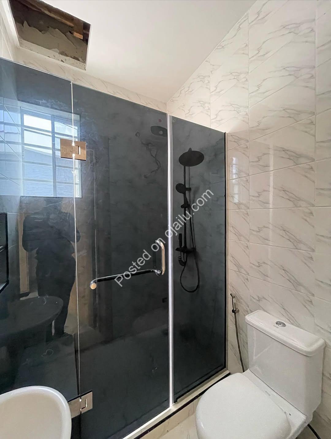 Contemporary 4-Bed Duplex with Walk-In Showers