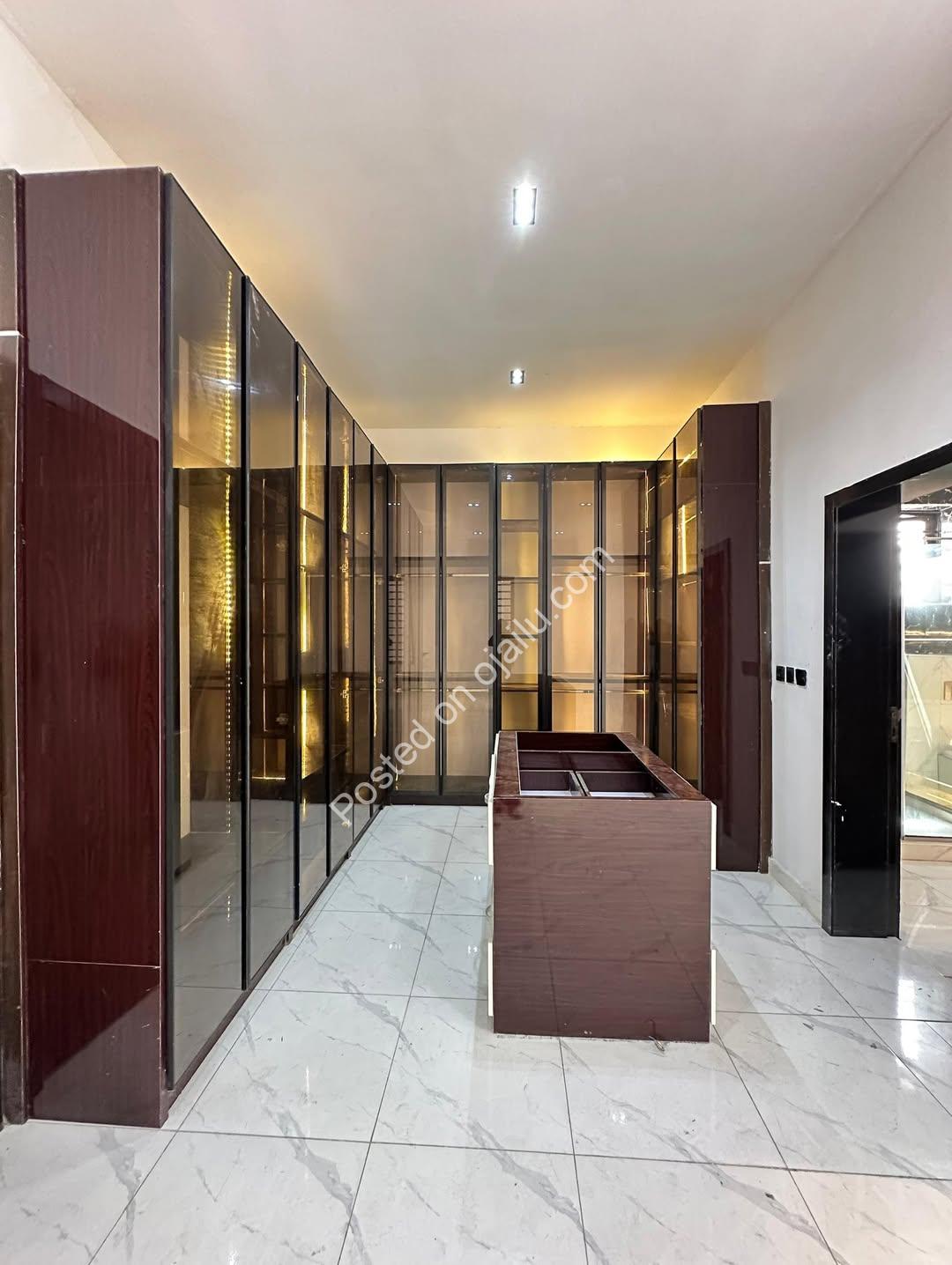 Modern Marvel: 5BR Duplex with Roof Terrace & Pool