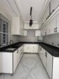 Contemporary 4-Bed Duplex with Walk-In Showers