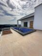 Modern Masterpiece: 5-Bed Smart Home with Rooftop Terrace