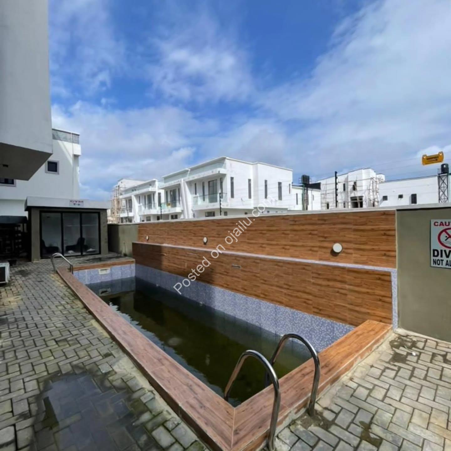 Ikota’s Finest: 1-Bed Apartment with Pool Access