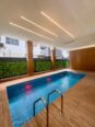 2BR Serviced Oasis: Pool, Gym & Elevator!